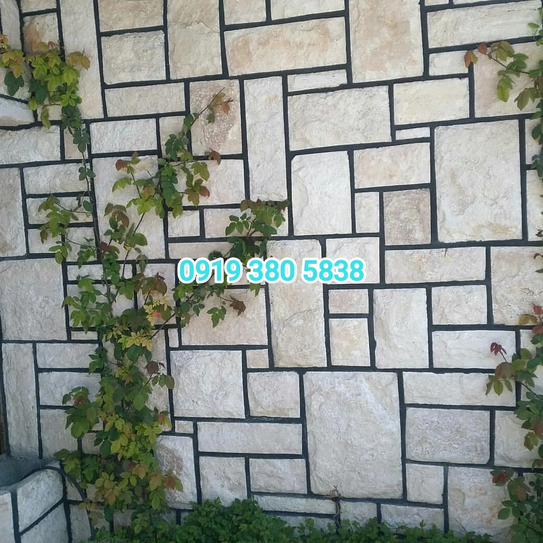 اجرای دیوار سنگی با سنگ مالون، همراه با استفاده از ملات سیمانی